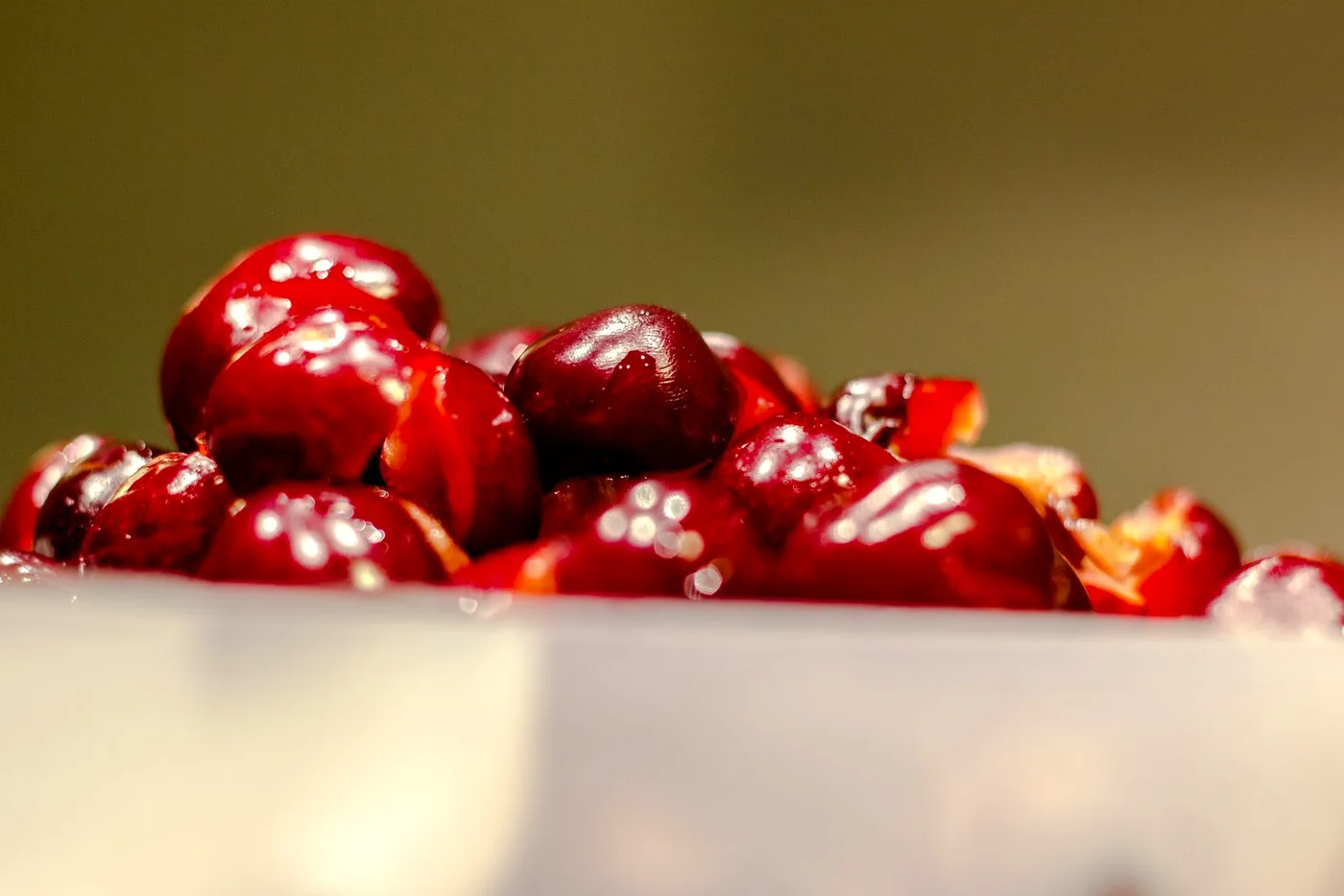 Fresh ripe Michigan cherries glistening in the sun, the signature fruit behind Glen Arbor's Cherry Republic store